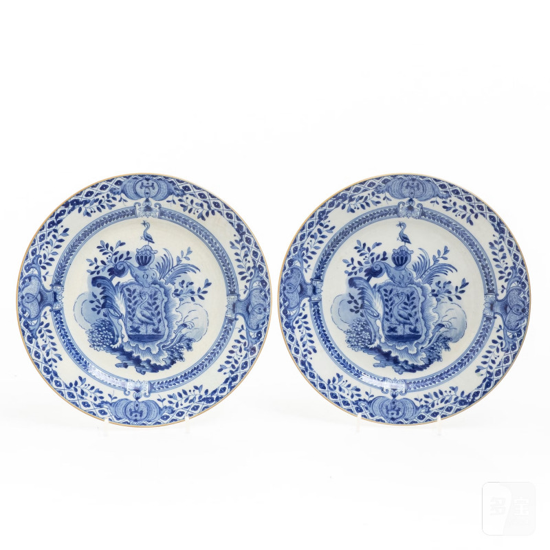 A pair of armorial dinner plates,